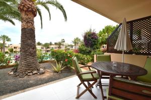 Balkón nebo terasa v ubytování Apartment Apple Dunes with Pool Corralejo By Holidays Home