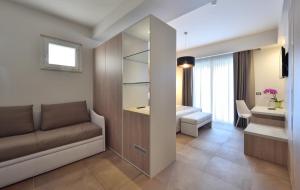 Postel nebo postele na pokoji v ubytování Hotel Pietra di Luna