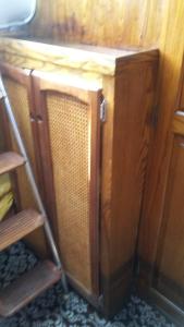 a wooden cabinet in a room with a ladder at Classic Sailboat 30’ in Miami +12 photos