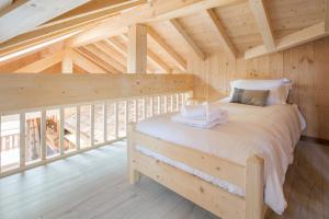 Llit o llits en una habitació de Simply Morzine - Apartment du Centre