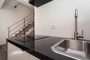 Kuchyň nebo kuchyňský kout v ubytování Apartments Stube 4