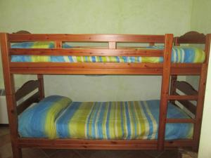 Palanda nebo palandy na pokoji v ubytování Agriturismo Il Vecchio Carro