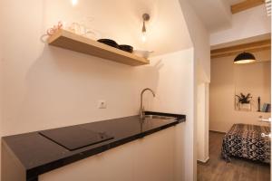 Kuchyň nebo kuchyňský kout v ubytování Apartments Stube 4
