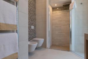 Ett badrum på Palazzo IrMa - Hotel - B&B Luxury