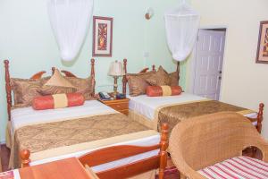 Hotel Alexandrina 객실 침대