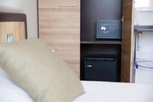 Ένα ή περισσότερα κρεβάτια σε δωμάτιο στο Kristal