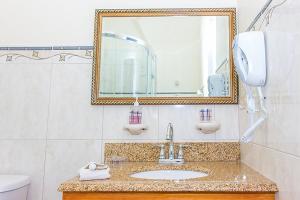 Een badkamer bij Hotel Alexandrina