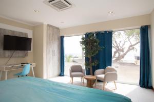 TV a/nebo společenská místnost v ubytování Hotel Islander Bonaire