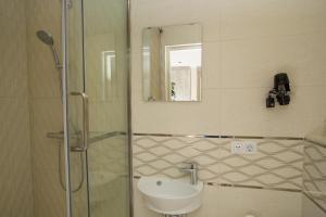 Koupelna v ubytování Hotel Islander Bonaire + 35 fotografií