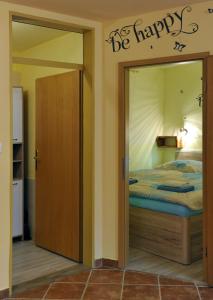 Posteľ alebo postele v izbe v ubytovaní apartma Marjetica