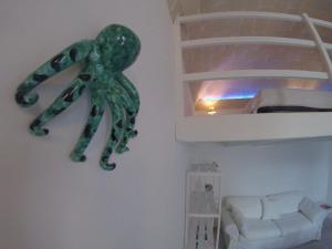 A bed or beds in a room at Casa di Ninni Mono