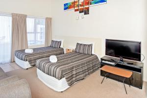 Postel nebo postele na pokoji v ubytování Tourist Court Motel