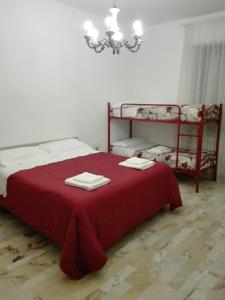 En eller flere senge i et værelse på Casa Dilva
