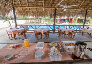 Restoran või mõni muu söögikoht majutusasutuses Hotel Guanacaste Lodge