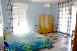 Katil atau katil-katil dalam bilik di Albergo Drena