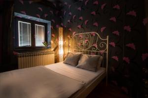 Postel nebo postele na pokoji v ubytování Hostel Centar