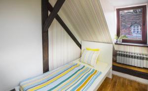 Postel nebo postele na pokoji v ubytování Hostel Centar