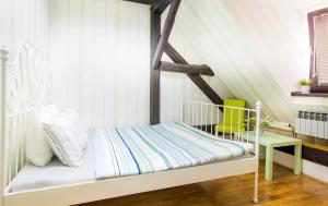 Postel nebo postele na pokoji v ubytování Hostel Centar