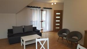 Posedenie v ubytovaní Apartamenty Kapitanskie