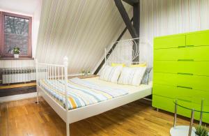 Postel nebo postele na pokoji v ubytování Hostel Centar