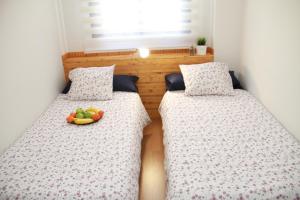 A bed or beds in a room at Teatro Cervantes SigloXXI