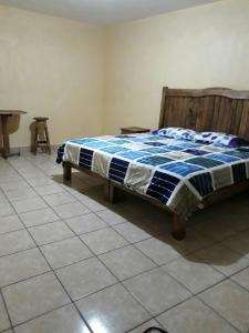 Postel nebo postele na pokoji v ubytování Hotel Villa Aurora