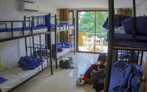Letto o letti in una camera di P & T Hostel