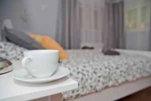 Postel nebo postele na pokoji v ubytování Grey House