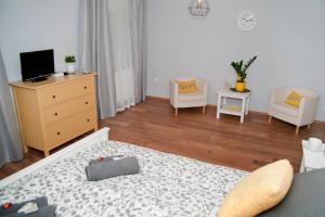 TV a/nebo společenská místnost v ubytování Grey House