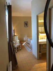 Postel nebo postele na pokoji v ubytování Hotel Le Cilaos