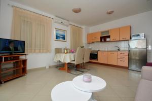 Kuchyň nebo kuchyňský kout v ubytování Apartmani Trogir