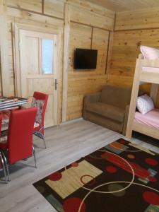 TV a/nebo společenská místnost v ubytování Katipogulları Apart