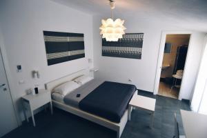 Postel nebo postele na pokoji v ubytování Accomodation Libertino