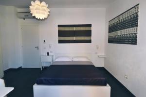 Postel nebo postele na pokoji v ubytování Accomodation Libertino