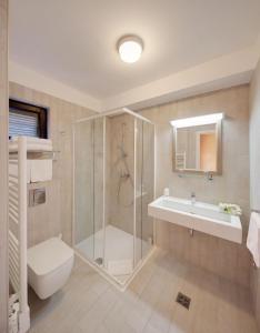 Koupelna v ubytování Apartments Amfora Plava Laguna