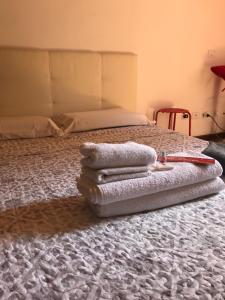 Postel nebo postele na pokoji v ubytování MyRoom Città Alta 1