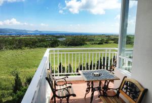 A balcony or terrace at Coral B&B
