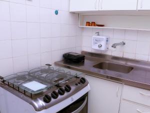 Dapur atau dapur kecil di Copacabana 4 pessoas Pertinho da Praia!