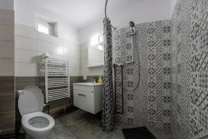 Koupelna v ubytování Casa Alex