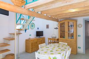 Et tv og/eller underholdning på Appartamento Poggio al Sole