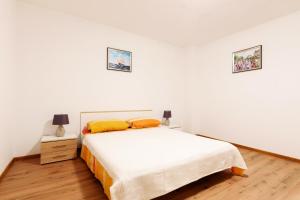 Postel nebo postele na pokoji v ubytování Apartman Lastavica