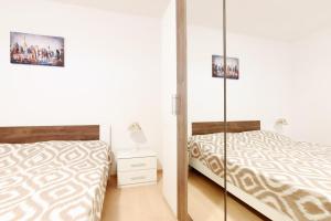 Postel nebo postele na pokoji v ubytování Apartman Lastavica