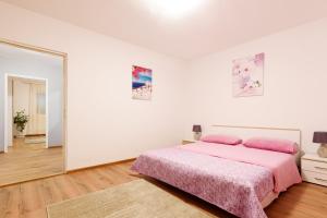 Postel nebo postele na pokoji v ubytování Apartman Lastavica