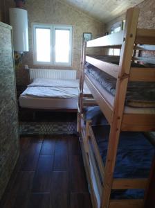 Postel nebo postele na pokoji v ubytování Ubytovanie Lesky