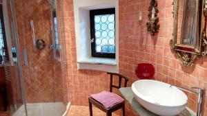 a bathroom with a tub and a sink and a shower at Porta Rose in Garessio +27 photos