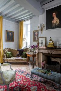 Posezení v ubytování Hôtel Tanquerey de La Rochaisière