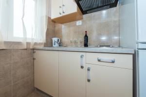 Kuchyň nebo kuchyňský kout v ubytování Guesthouse Miranda NP Krka