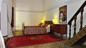 Postel nebo postele na pokoji v ubytování Riad Razane Fez
