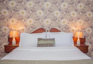 En eller flere senger på et rom på Ardree House B&B