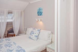 En eller flere senger på et rom på Ardree House B&B